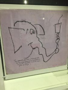 Squiggle of an Elephant holding a candle done by Mr Squiggle.