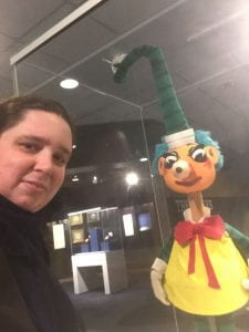 Miss H with Mr Squiggle puppet at the Australian Mint exhbition